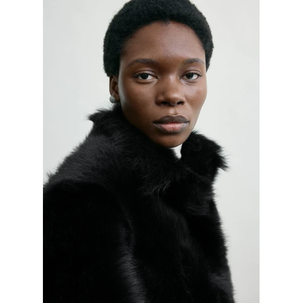 Totême Silky shearling jacket in Black - Jackets - Scandinavian Minimalist Luxury at Coveti