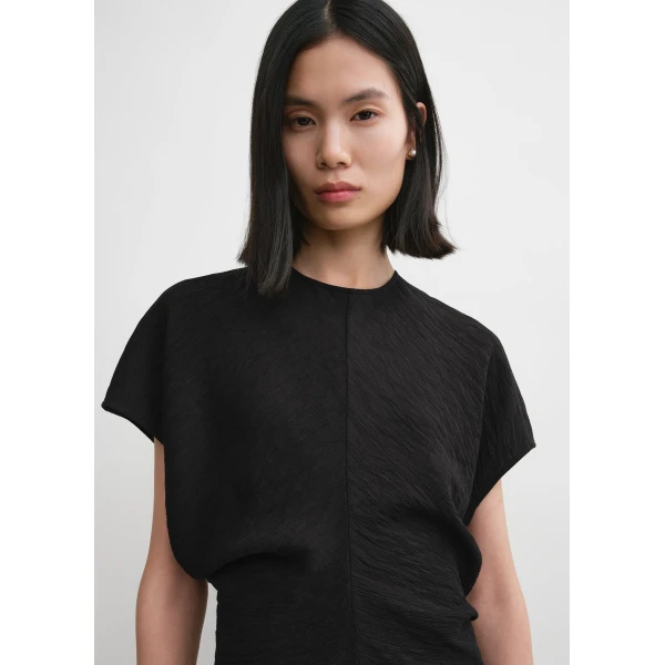 Totême Slouch waist crinkled dress in Black - Dresses - Scandinavian Minimalist Luxury at Coveti