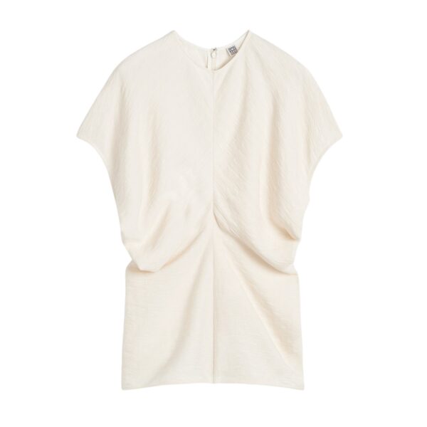 Totême Slouch waist crinkled top in Cream - Tops - Scandinavian Minimalist Luxury at Coveti