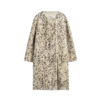 Totême Stracciatella shearling coat black/white in Black-white - Coats - Scandinavian Minimalist Luxury at Coveti