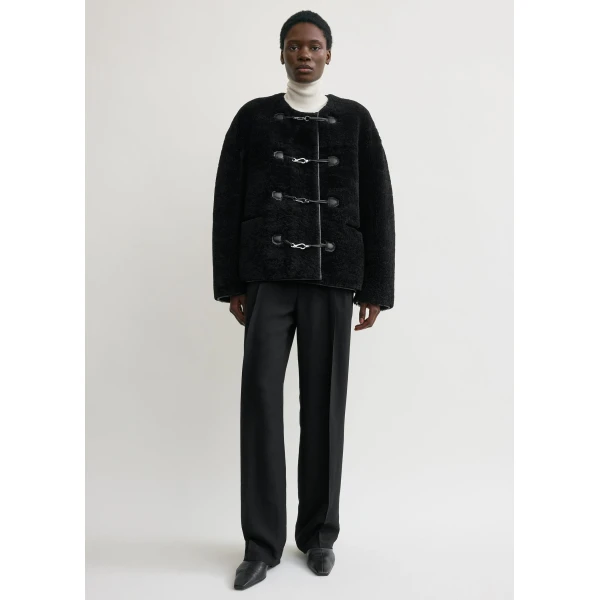 Totême Teddy shearling clasp jacket in Black - Jackets - Scandinavian Minimalist Luxury at Coveti