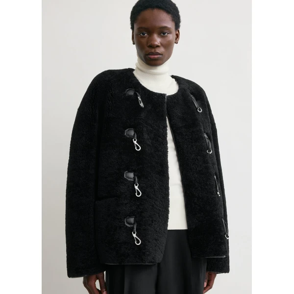 Totême Teddy shearling clasp jacket in Black - Jackets - Scandinavian Minimalist Luxury at Coveti