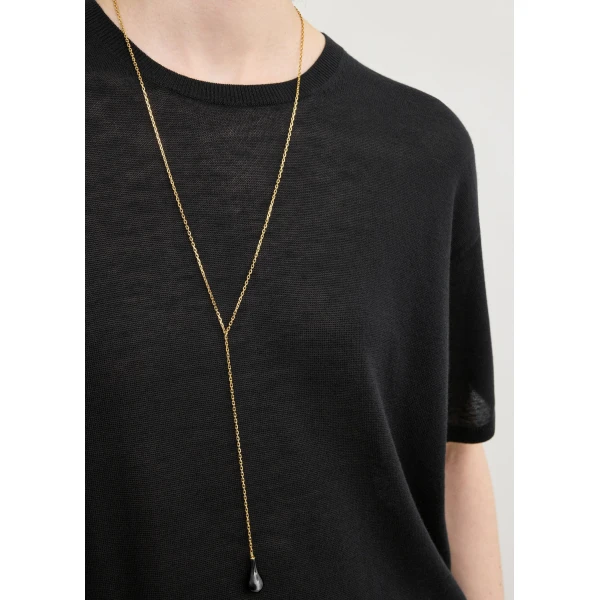 Totême Tee knit in Black - Tops - Scandinavian Minimalist Luxury at Coveti