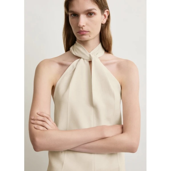 Totême Twist halter top in Ecru - Tops - Scandinavian Minimalist Luxury at Coveti