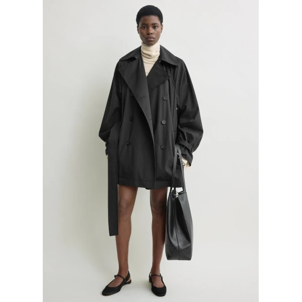Totême Washed cotton trench in Washed black - Coats - Scandinavian Minimalist Luxury at Coveti