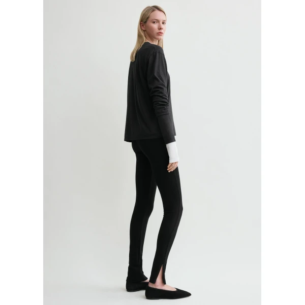 Totême Zip leggings in Black - Pants - Scandinavian Minimalist Luxury at Coveti