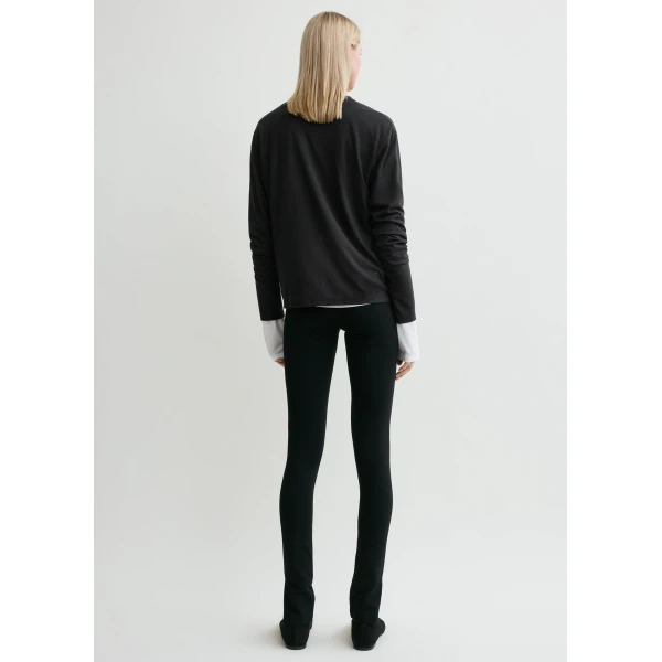 Totême Zip leggings in Black - Pants - Scandinavian Minimalist Luxury at Coveti
