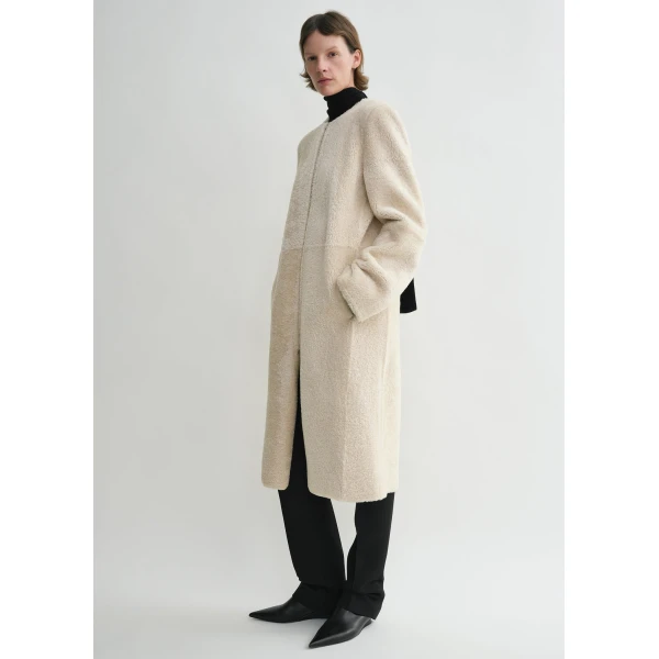Totême Zipped teddy shearling coat in Cream - Coats - Scandinavian Minimalist Luxury at Coveti