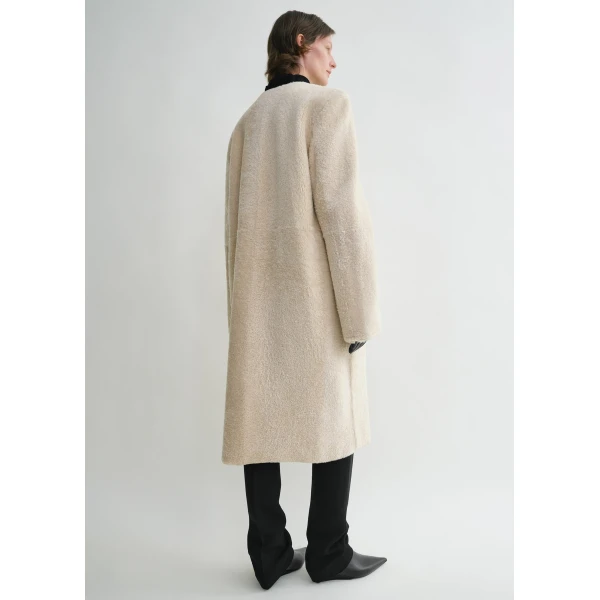 Totême Zipped teddy shearling coat in Cream - Coats - Scandinavian Minimalist Luxury at Coveti