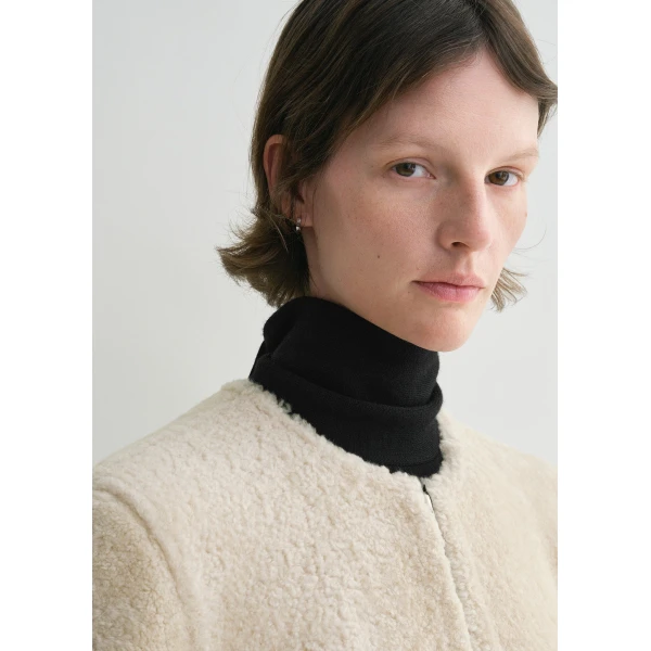Totême Zipped teddy shearling coat in Cream - Coats - Scandinavian Minimalist Luxury at Coveti