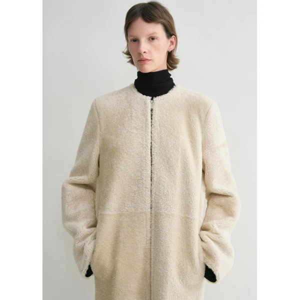 Totême Zipped teddy shearling coat in Cream - Coats - Scandinavian Minimalist Luxury at Coveti