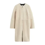 Totême Zipped teddy shearling coat in Cream - Coats - Scandinavian Minimalist Luxury at Coveti