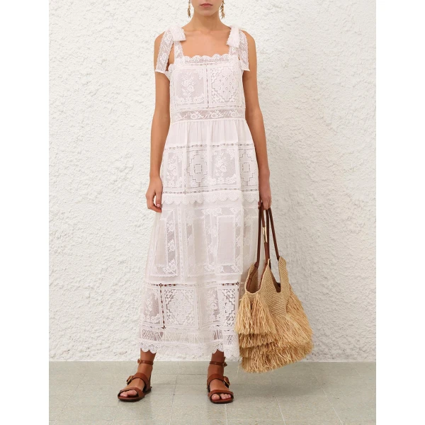 Elevate your elegance in this Zimmermann Dresses available now at Coveti