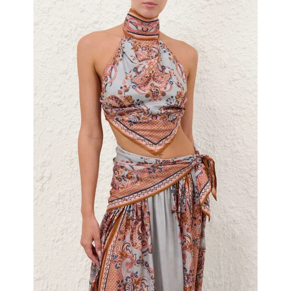 Elevate your elegance in this Zimmermann Tops available now at Coveti