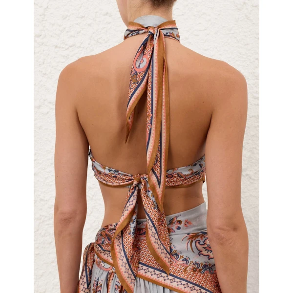 Elevate your elegance in this Zimmermann Tops available now at Coveti