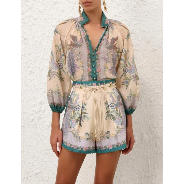 Elevate your elegance in this Zimmermann Tops available now at Coveti