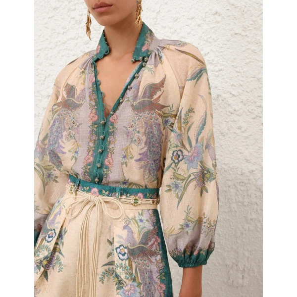 Elevate your elegance in this Zimmermann Tops available now at Coveti
