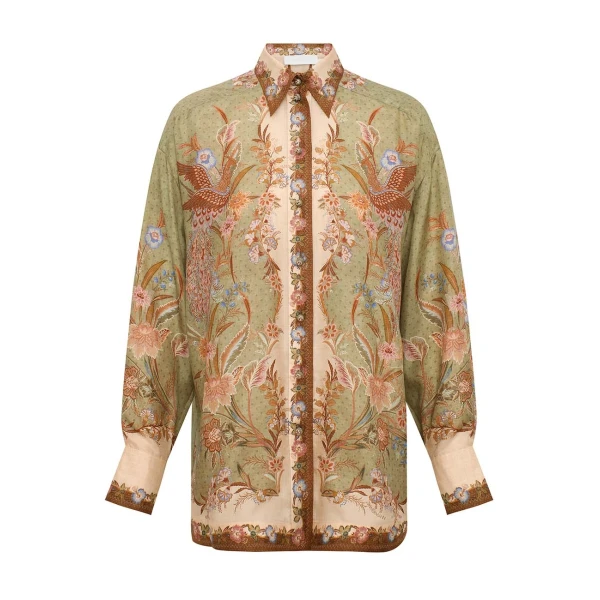 Elevate your elegance in this Zimmermann Tops available now at Coveti