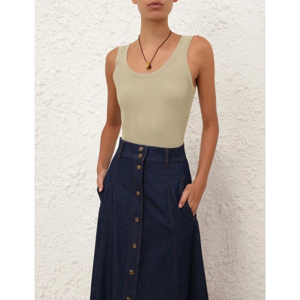 Elevate your elegance in this Zimmermann Tops available now at Coveti