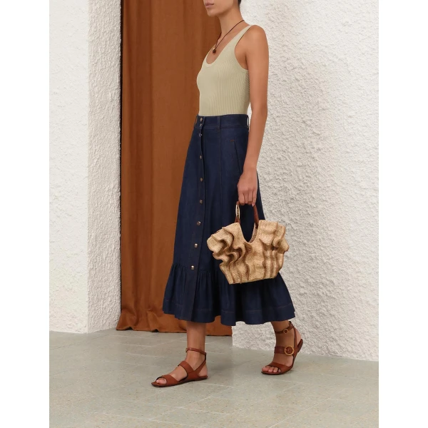 Elevate your elegance in this Zimmermann Tops available now at Coveti