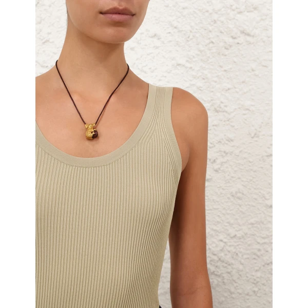 Elevate your elegance in this Zimmermann Tops available now at Coveti