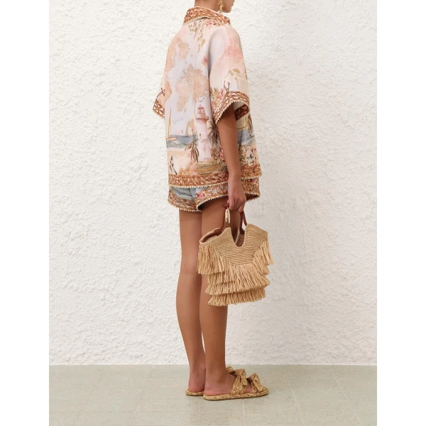 Elevate your elegance in this Zimmermann Tops available now at Coveti