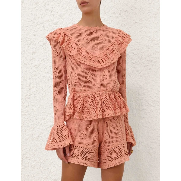 Elevate your elegance in this Zimmermann Tops available now at Coveti