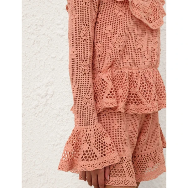 Elevate your elegance in this Zimmermann Tops available now at Coveti