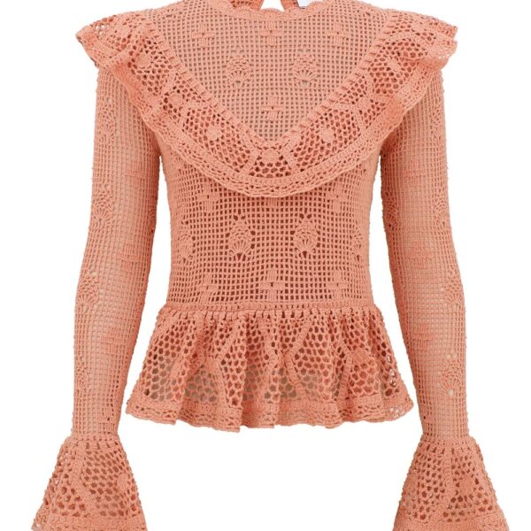Elevate your elegance in this Zimmermann Tops available now at Coveti