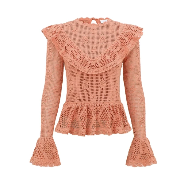 Elevate your elegance in this Zimmermann Tops available now at Coveti