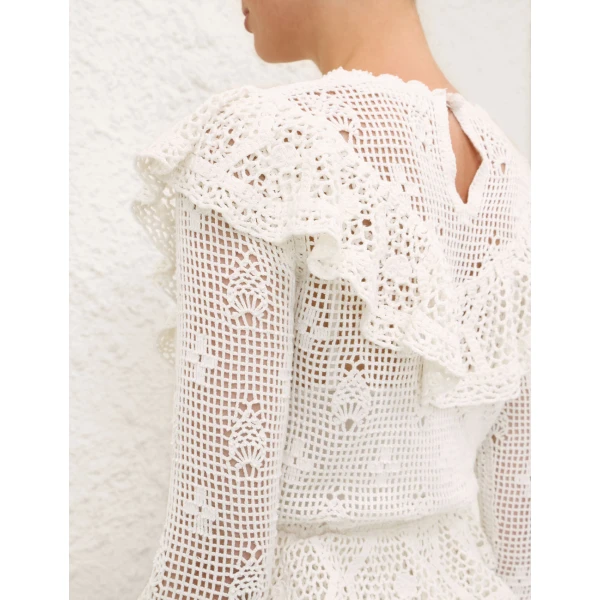 Elevate your elegance in this Zimmermann Dresses available now at Coveti
