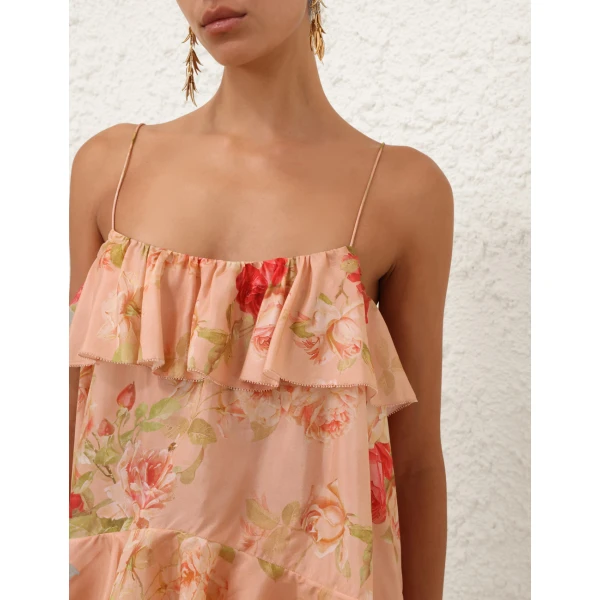 Elevate your elegance in this Zimmermann Tops available now at Coveti