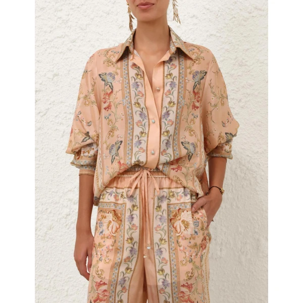 Elevate your elegance in this Zimmermann Tops available now at Coveti