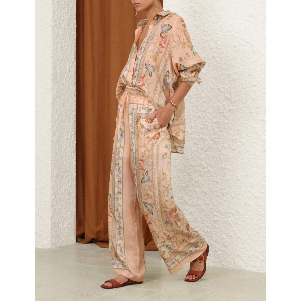Elevate your elegance in this Zimmermann Tops available now at Coveti