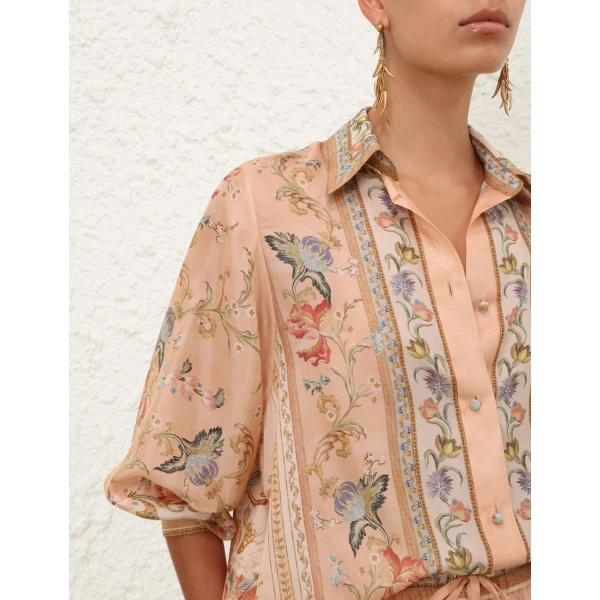 Elevate your elegance in this Zimmermann Tops available now at Coveti