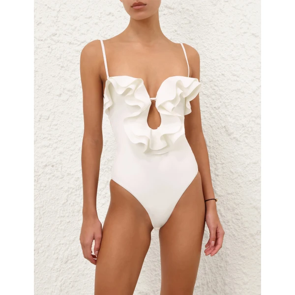 Elevate your elegance in this Zimmermann Beachwear available now at Coveti