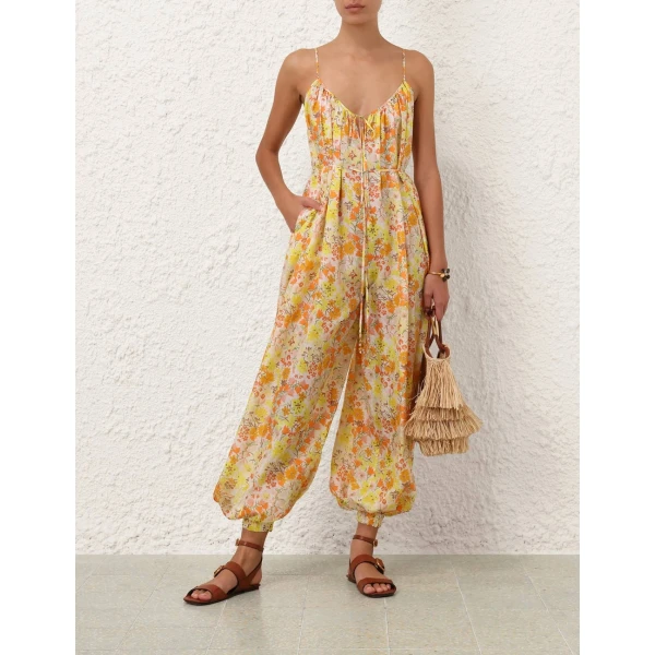 Elevate your elegance in this Zimmermann Jumpsuit available now at Coveti
