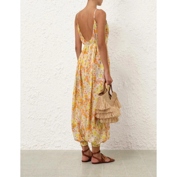 Elevate your elegance in this Zimmermann Jumpsuit available now at Coveti