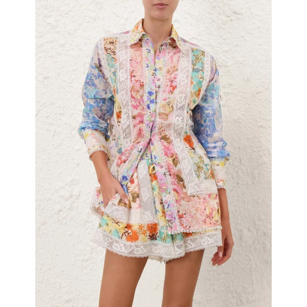 Elevate your elegance in this Zimmermann Tops available now at Coveti