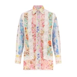 Elevate your elegance in this Zimmermann Tops available now at Coveti