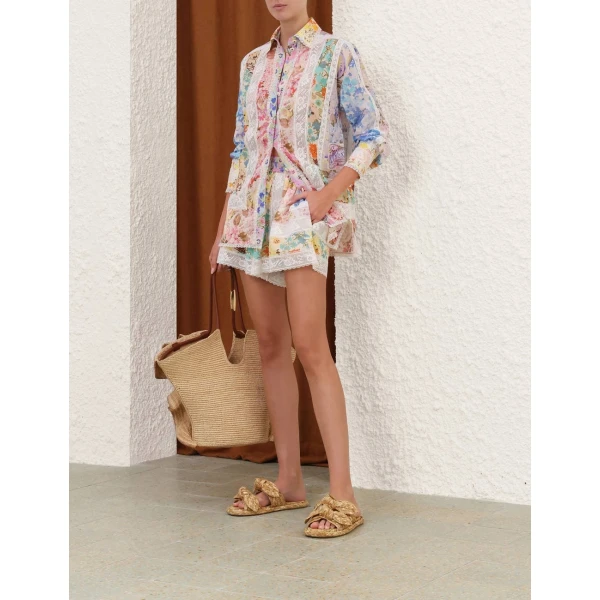 Elevate your elegance in this Zimmermann Tops available now at Coveti