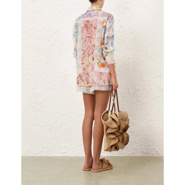 Elevate your elegance in this Zimmermann Tops available now at Coveti