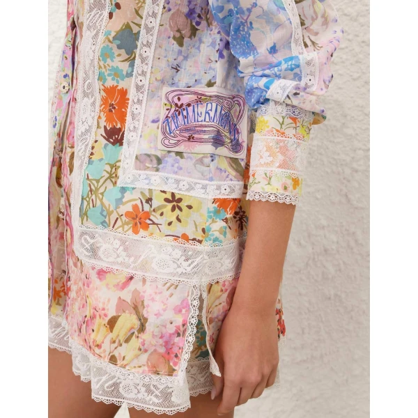 Elevate your elegance in this Zimmermann Tops available now at Coveti