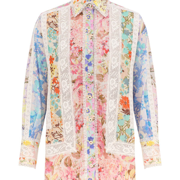 Elevate your elegance in this Zimmermann Tops available now at Coveti