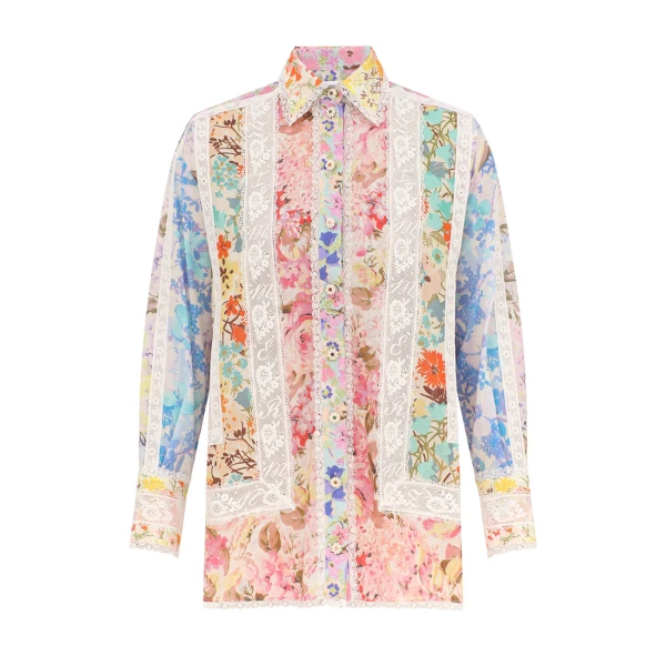 Elevate your elegance in this Zimmermann Tops available now at Coveti