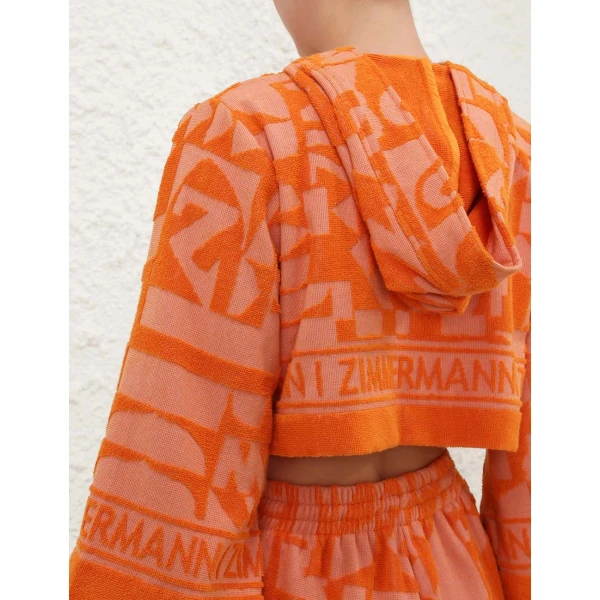 Elevate your elegance in this Zimmermann Tops available now at Coveti