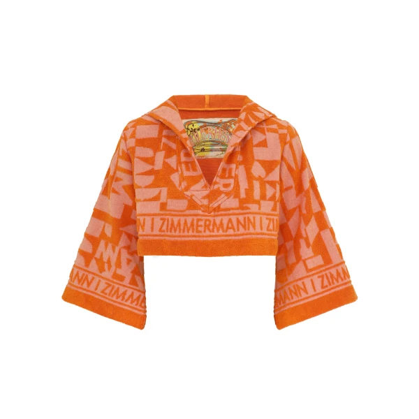 Elevate your elegance in this Zimmermann Tops available now at Coveti