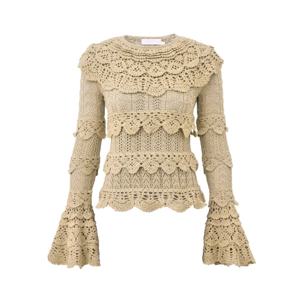 Elevate your elegance in this Zimmermann Tops available now at Coveti