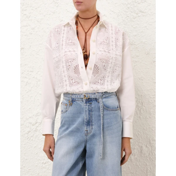 Elevate your elegance in this Zimmermann Tops available now at Coveti