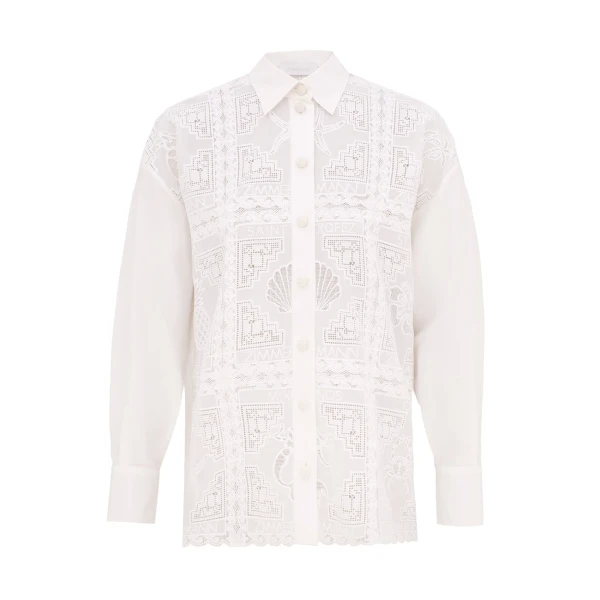 Elevate your elegance in this Zimmermann Tops available now at Coveti